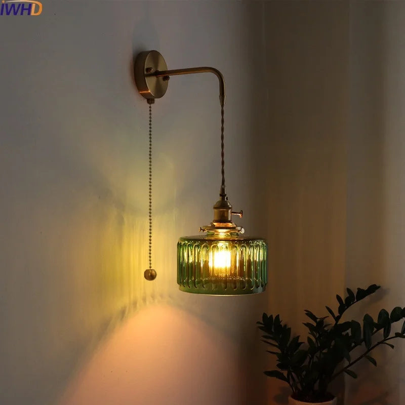 green copper wall sconce, front view on white background