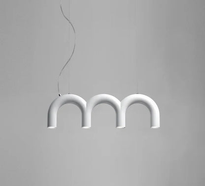 Long arched tube chandelier shown with its twin cord suspension