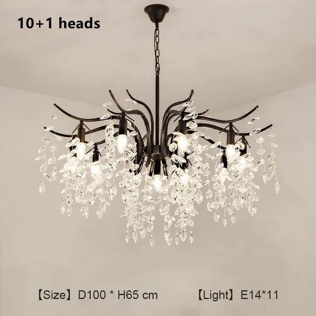 Black branch chandelier with crystal drops on a chain suspension