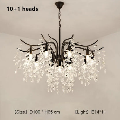 Black branch chandelier with crystal drops on a chain suspension