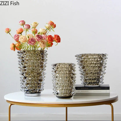 Creative ribbed glass vase transparent with fresh blooms inside