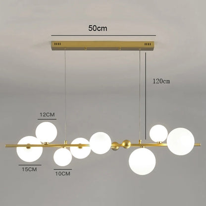 Non dimmable linear chandelier sized for a kitchen island or dining table