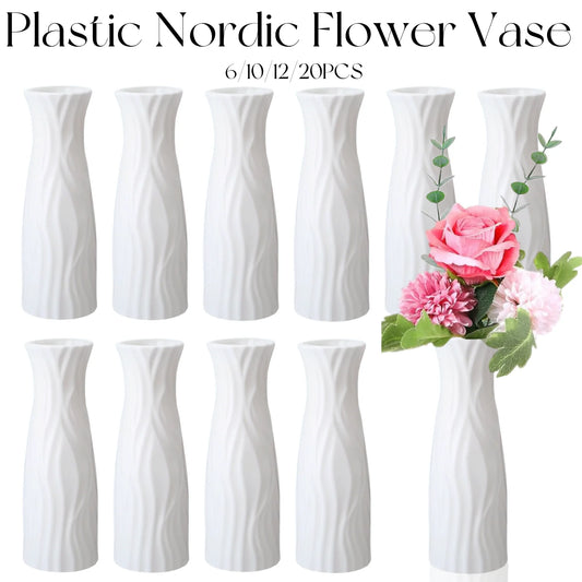 Nordic white plastic bud vases in set of six on table