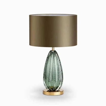 Modern glass lamp side profile showing full silhouette and weighted base