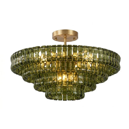 Clear glass chandelier shades on a semi-flush mounted iron frame in gold
