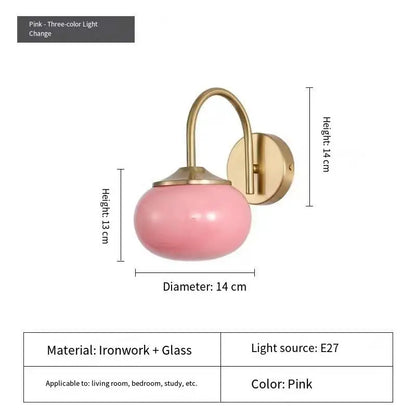 Three head frosted glass chandelier in pink with gold toned arms