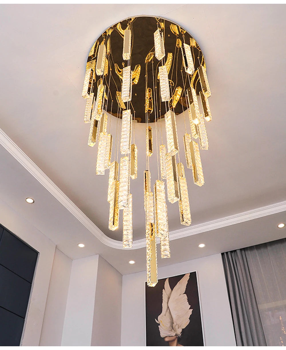 Gold plated spiral crystal chandelier with a long cascading column