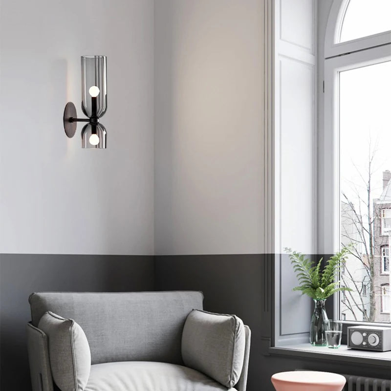 glass wall sconce, detail view of fixture base and arm