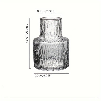 Glacier textured wide mouth glass vase on marble surface with clean background