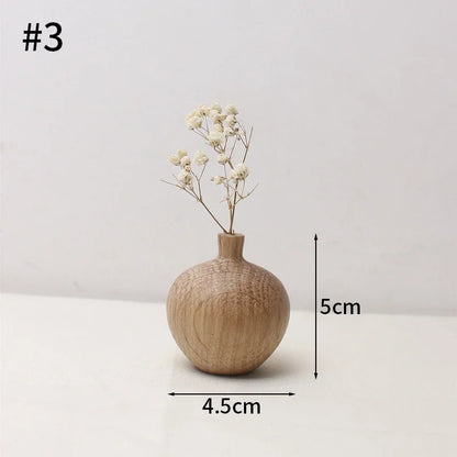 Side profile of Japanese wooden flower vase showing compact minimalist silhouette