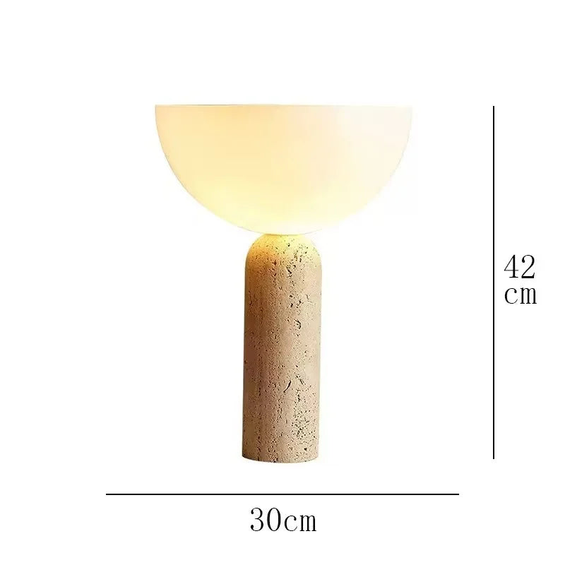 Travertine stone lamp switched off showing natural stone base form