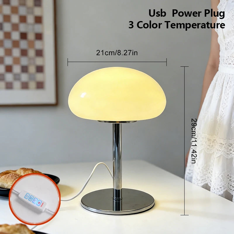 Four cloud lamp colour variants orange pink cream white displayed