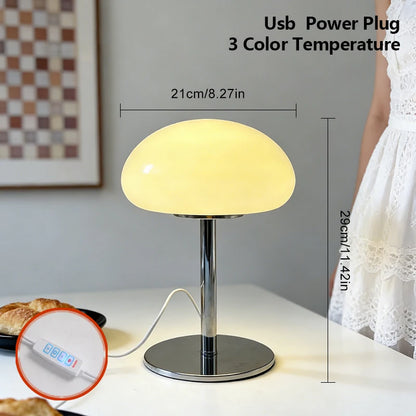 Four cloud lamp colour variants orange pink cream white displayed