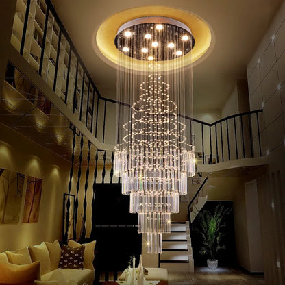 K9 crystal shades tapering down from a semi flush ceiling plate