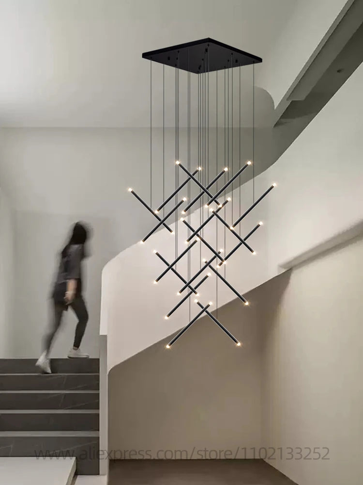 Black aluminium heads with acrylic diffusers on cord pendants