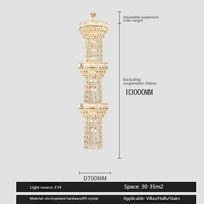 Long spiral crystal chandelier with cold light for a restaurant void