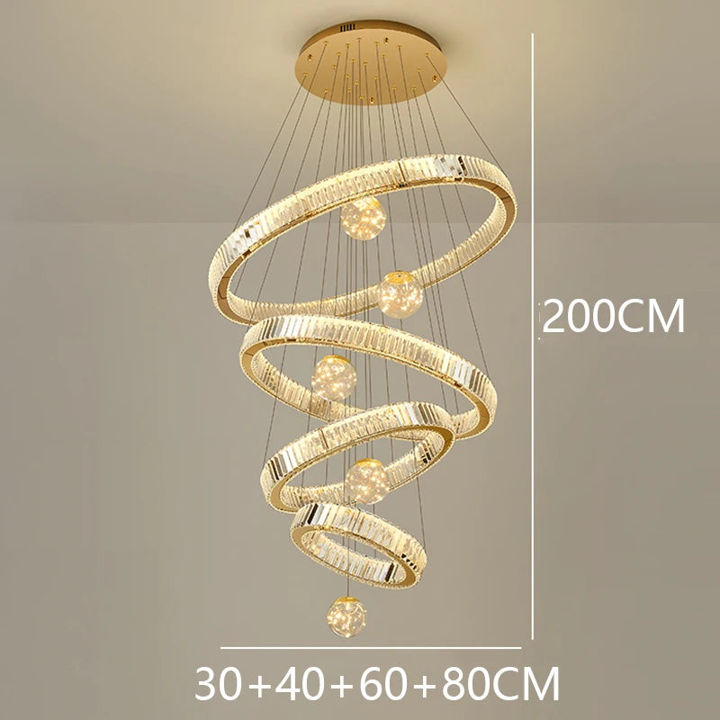 Brushed stainless steel rings strung with crystal on a tiered chandelier