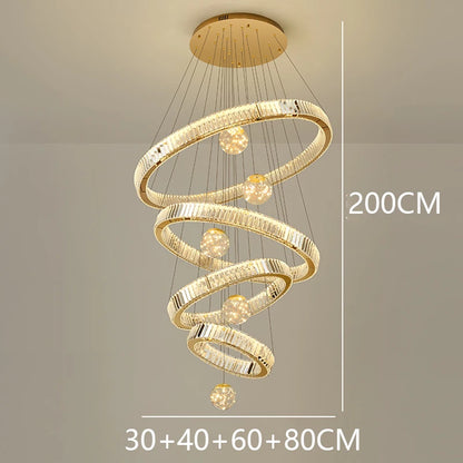 Brushed stainless steel rings strung with crystal on a tiered chandelier
