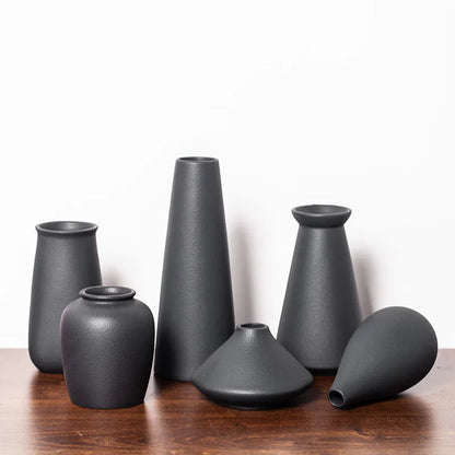 Close-up of smooth matte frosted glaze surface texture on small ceramic bud vase
