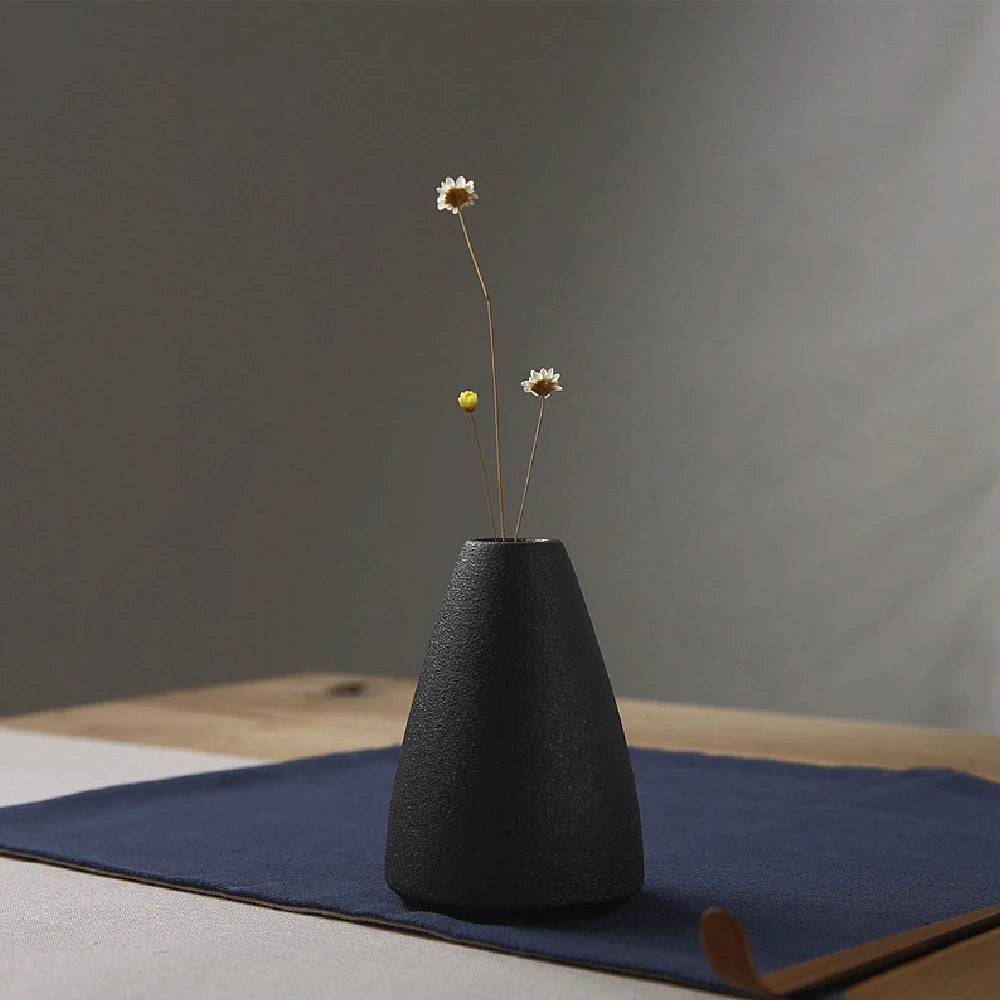 Style F minimal ceramic small vase displayed in Japandi interior
