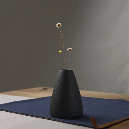Style F minimal ceramic small vase displayed in Japandi interior