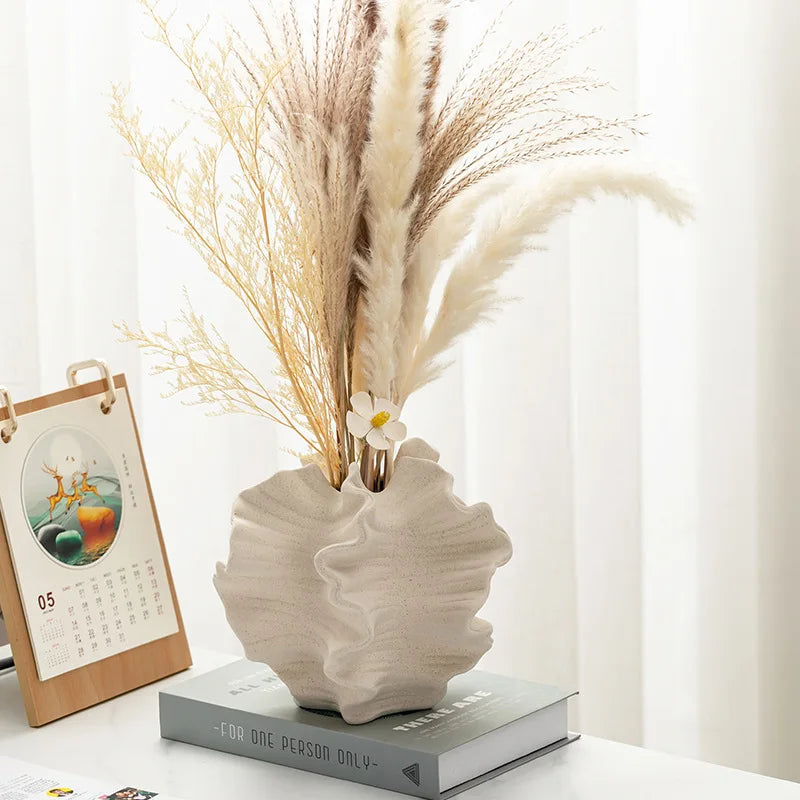 Ceramic flower vase with geometric wavy pattern in white