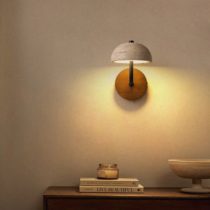 travertine stone bathroom wall sconce, installed in a room interior setting