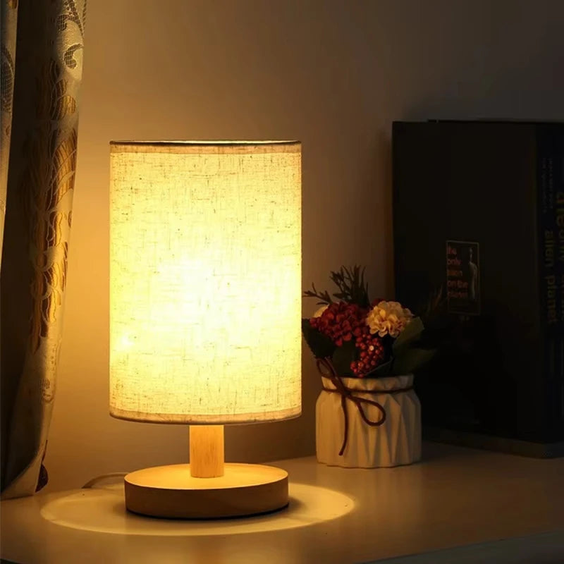 Chinese fabric lamp grey variant on bedroom bedside table warm glow