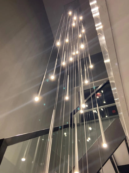 Remote dimming staircase chandelier shifting from warm to white light