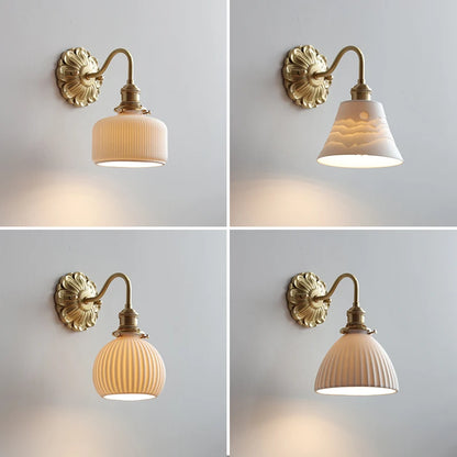 copper bathroom wall sconce, detail view of fixture base and arm
