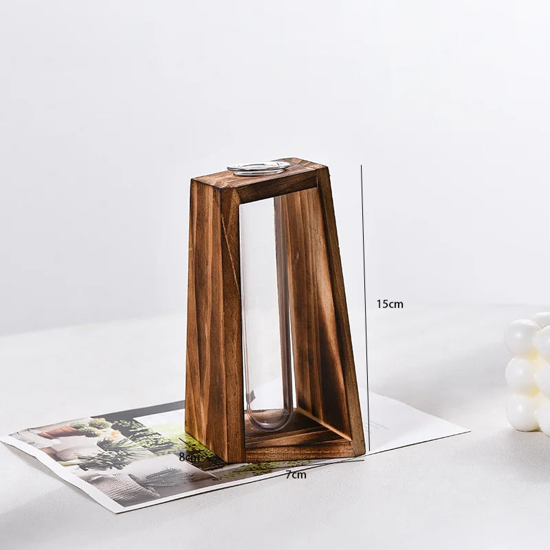 Warm wood and glass propagation vase in retro style on Japandi home shelf