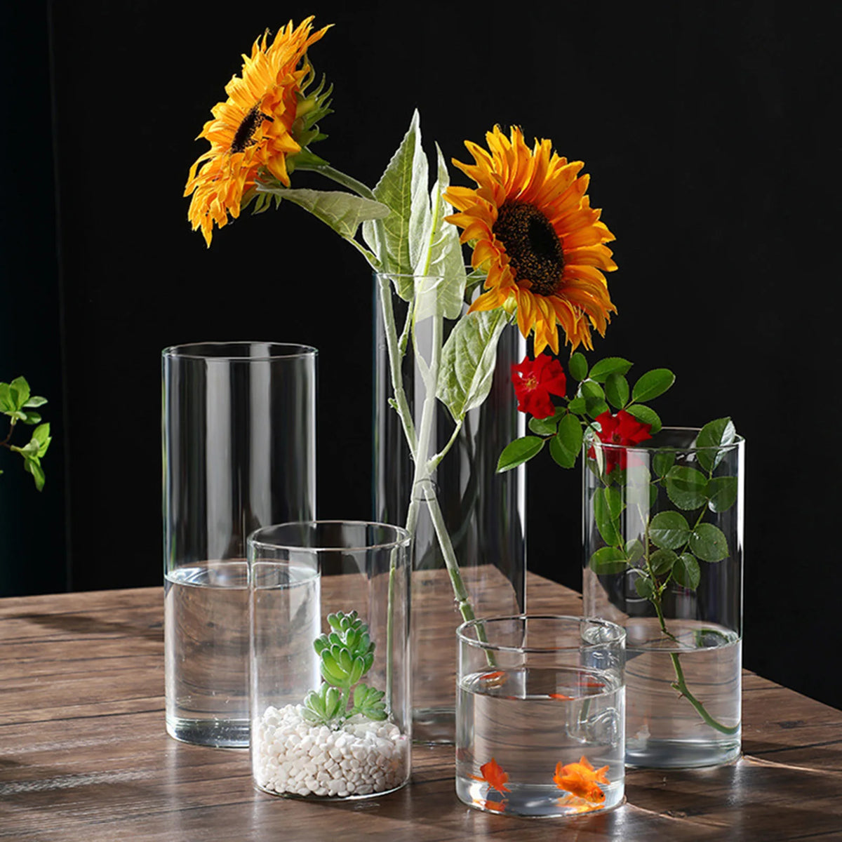 Clear glass hydroponic vase with flower arrangement closeup