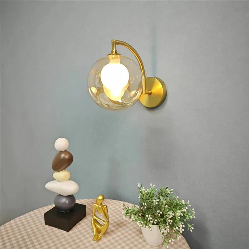 glass wall sconce, installed in a room interior setting