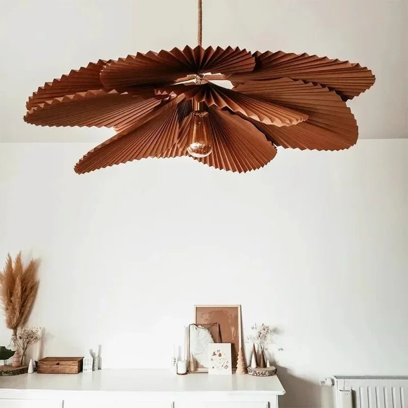 Wabi sabi paper fan chandelier with pleated panels in a flower shape