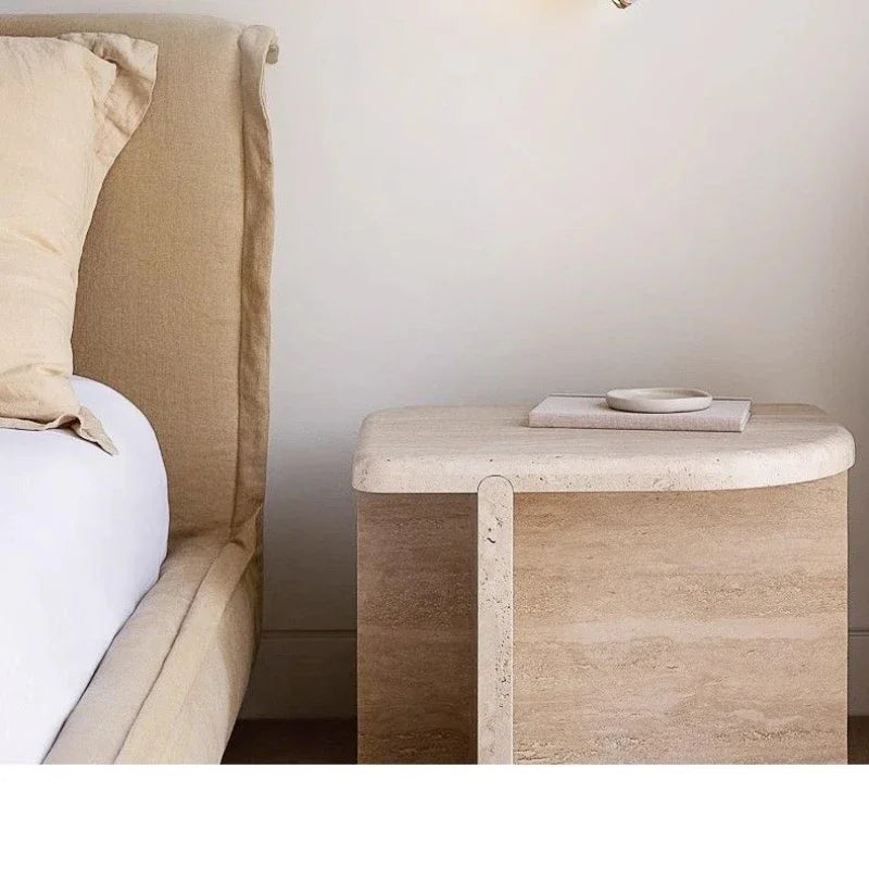 stone wall sconce, detail view of fixture base and arm