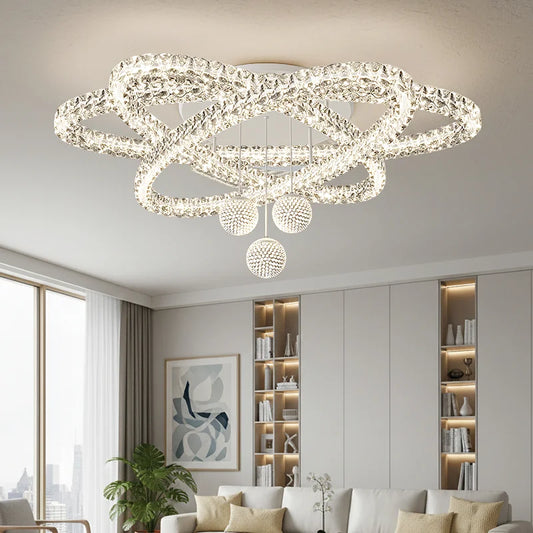 Brushed steel and acrylic chandelier with a surface mounted ceiling plate