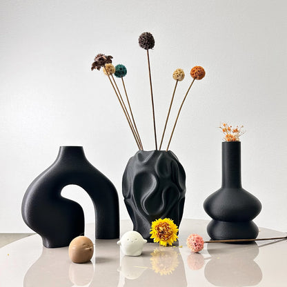Black bohemian geometric vase set three pieces on shelf