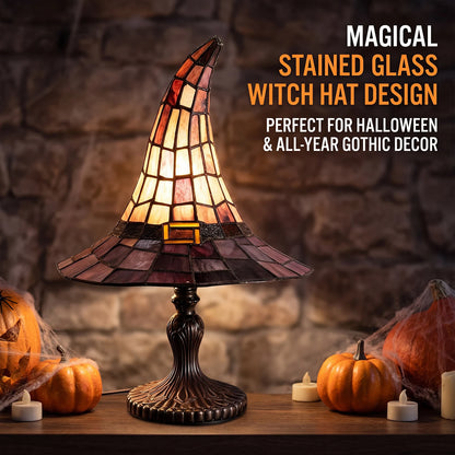 Handcrafted resin witch table lamp switched on warm accent glow