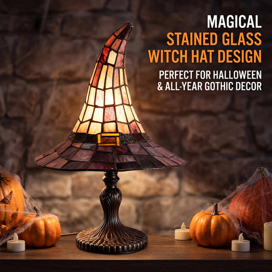 Handcrafted resin witch table lamp switched on warm accent glow