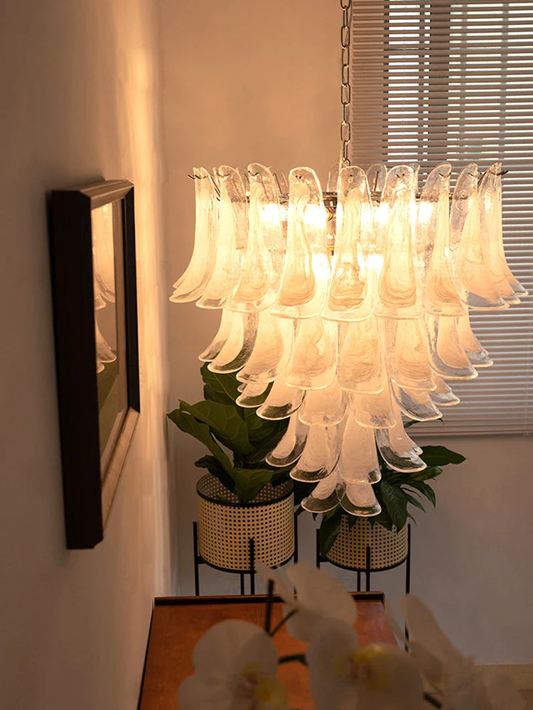 Four tier cloudy glass chandelier at 31.5 in across, semi-flush mounted