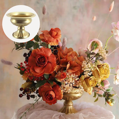 White metal vase candle holder as elegant formal dining table centrepiece