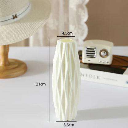 Multiple Nordic plastic decorative vases as grouped living room shelf display