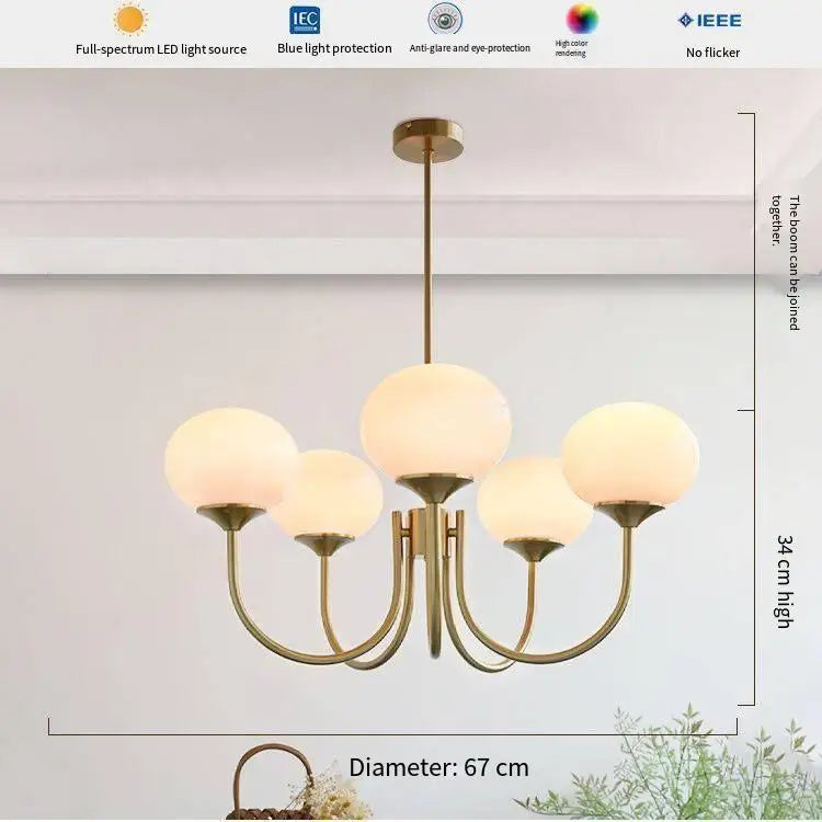 Frosted glass globe shade set on the chandelier slim chrome arm