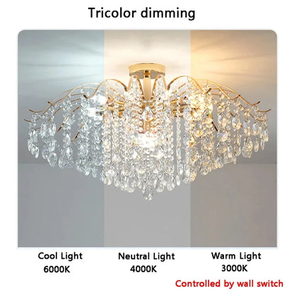 Ten head crystal chandelier measuring 19.7 in across in warm light