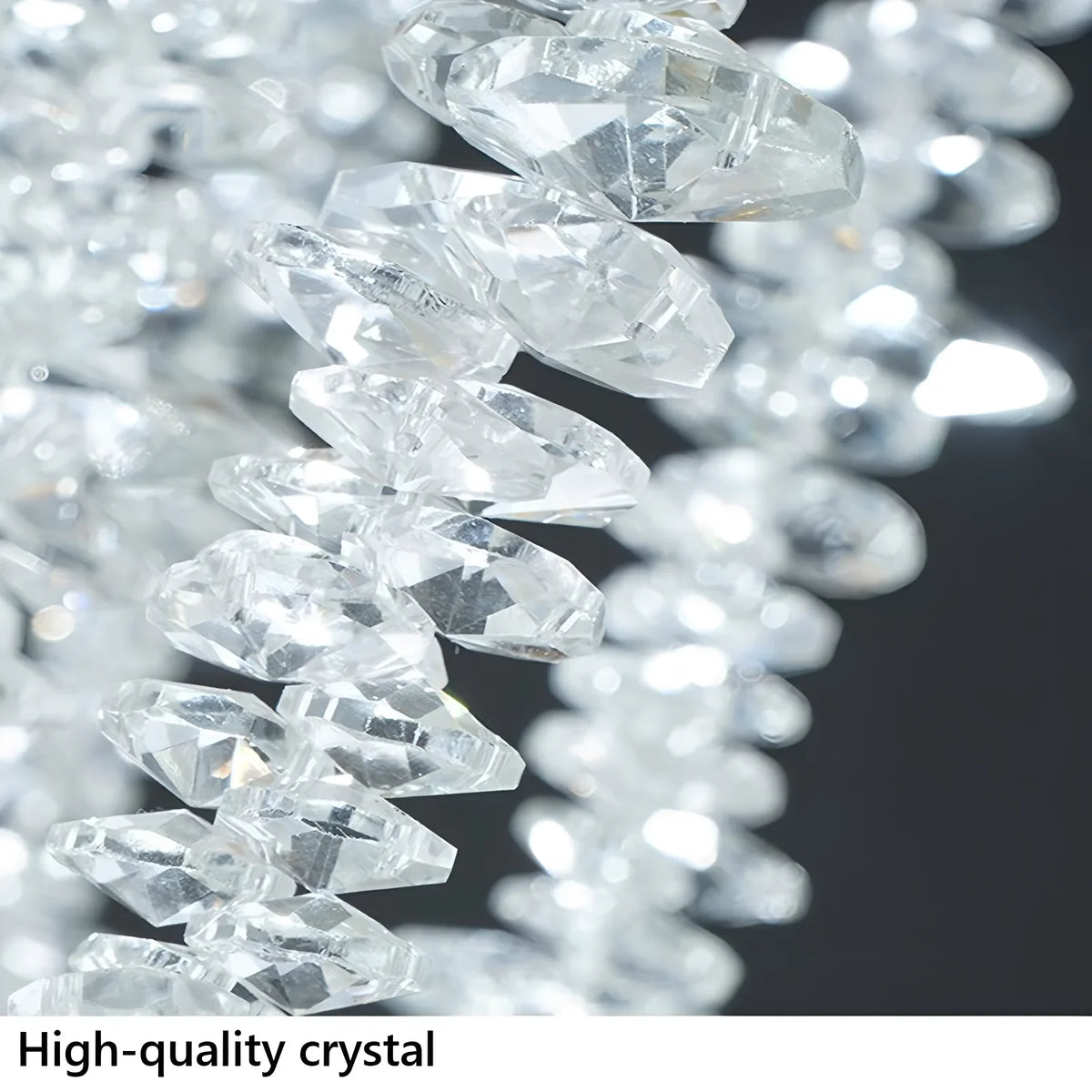 Clear crystal branches catching light along their length in gold