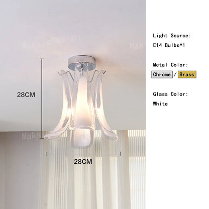 Petal shaped glass shades opening from a central polished steel stem