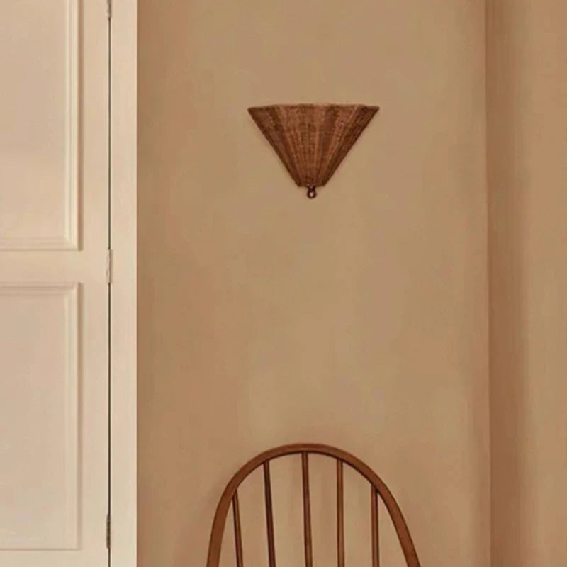 rattan wall sconce, close-up of shade and hardware detail