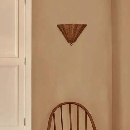 rattan wall sconce, close-up of shade and hardware detail