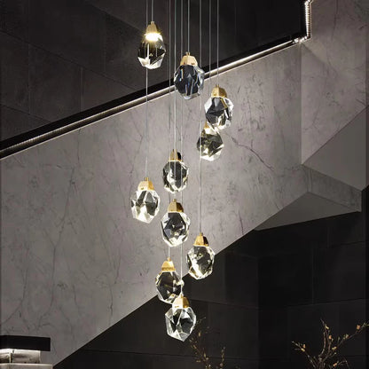 Crystal heads ringed around an iron chandelier frame on cords