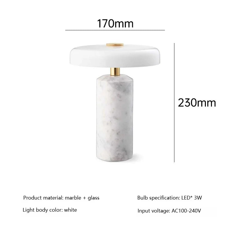 Marble table lamp switched off showing smooth weighted base form